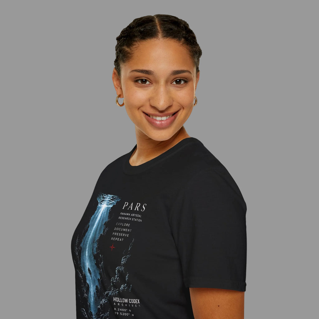 Female model wearing a black PARS T-shirt featuring the blue abyssal trench and descending diver graphic with Panama Abyssal Research Station and Hollow Codex Archives details.