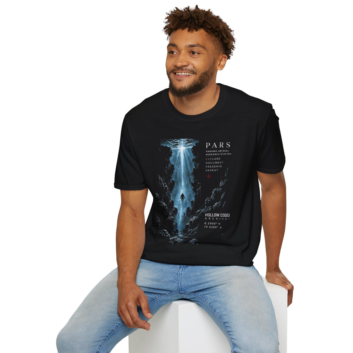 Model wearing a black PARS T-shirt featuring the blue abyssal trench and descending diver graphic with Panama Abyssal Research Station and Hollow Codex Archives details.