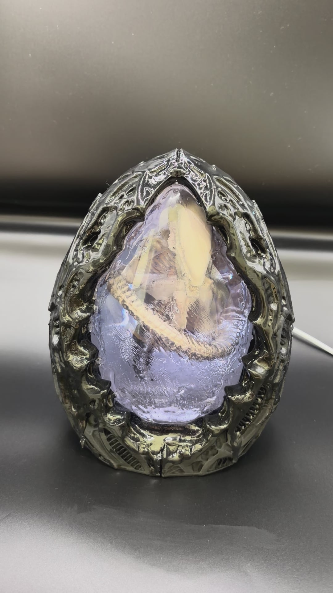 Shardlurker Specimen Night Light with translucent blue resin egg showing the fetal specimen inside while the light is off