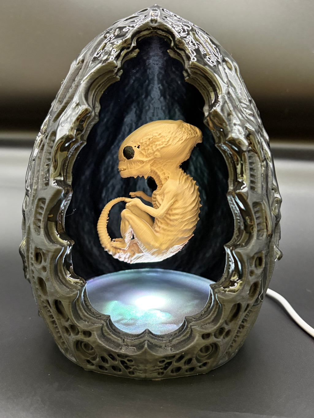 Shardlurker Specimen Night Light with glossy resin-finished containment egg illuminated in cool white light