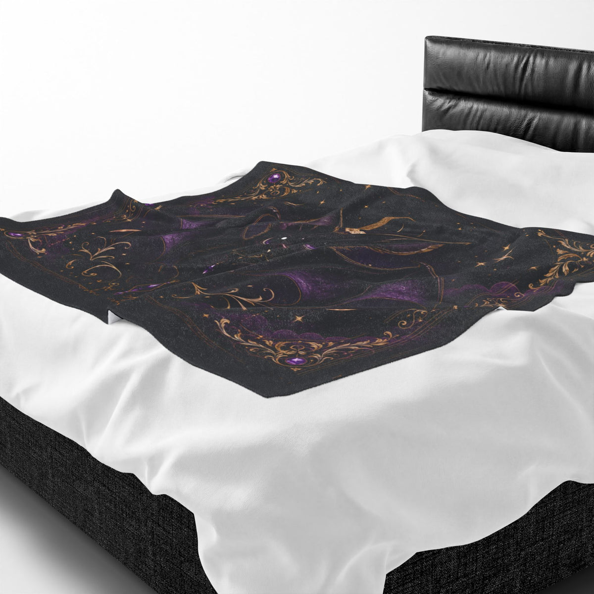 Vespertine Gothic Moon Bat velveteen plush blanket displayed on a bed with black and purple celestial artwork