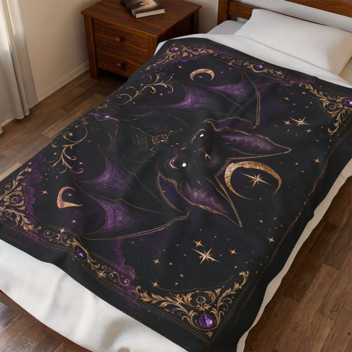 Vespertine Gothic Moon Bat velveteen plush blanket displayed on a bed in a bedroom with purple bat and celestial artwork