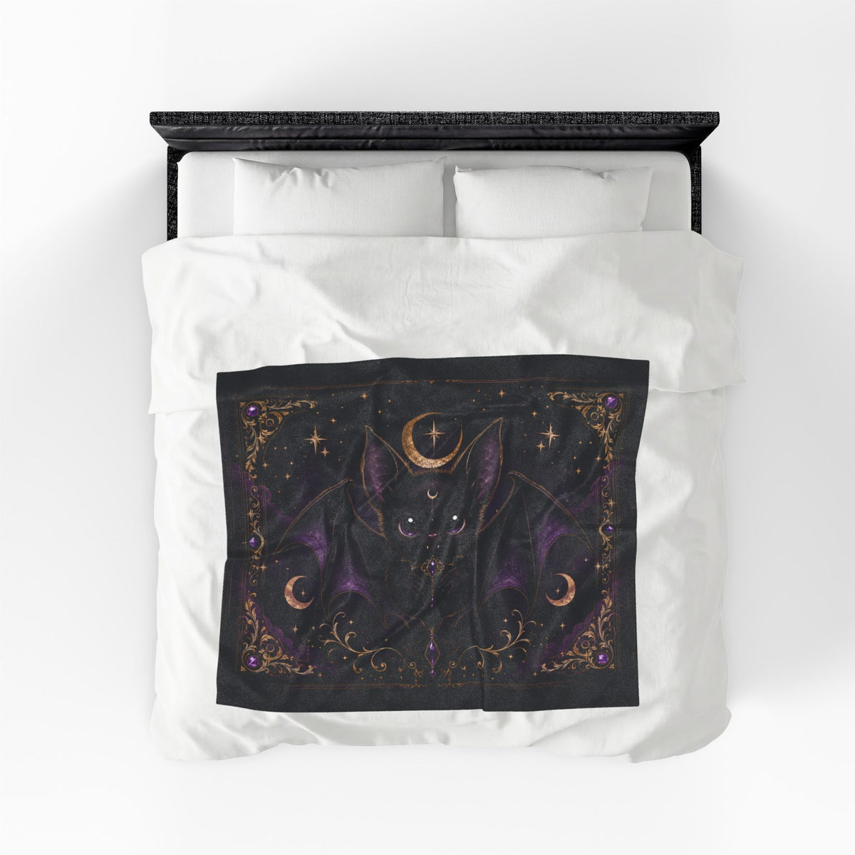 Vespertine Gothic Moon Bat velveteen plush blanket displayed flat on a bed with celestial bat artwork